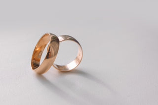 pair of rose gold engagement rings